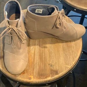 TOMS wedge bootie with lace tie ups.